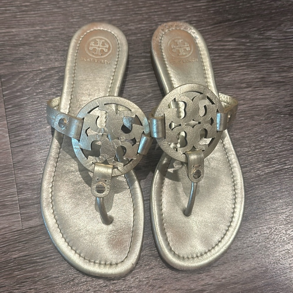 Gold Tory Burch flip flops